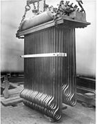 Superheater of a Lancashire boiler 1900, for the extraction of heat from waste gasses, and transfer of heat to saturated steam passing from the boiler to the steam range or engine. This raised the overall thermal efficiency of the plant, and would also prevent damage from slugs of condensate by ensuring the saturated steam was dry and not wet.[112]