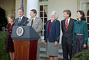Vice President-elect Dan Quayle (second from right) and his wife Marilyn with Vice President and President-elect George H. W. Bush and his wife Barbara, as well as outgoing president Ronald Reagan and his wife Nancy during a press conference held in the White House Rose Garden during the 1988–89 presidential transition of George H. W. Bush
