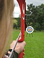Target shooting with a recurve bow.