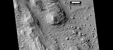 Layered terrain, as seen by HiRISE under HiWish program. Location is East of Gale Crater in the Aeolis quadrangle.