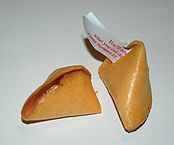 An opened fortune cookie