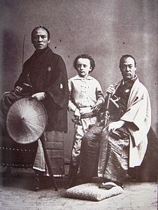 Nadar's son (center) with Yatsu Kanshiro (left) and an unnamed samurai (right), photographed by Nadar. They were members of the Second Japanese Embassy to Europe in 1863.
