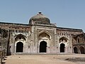 Khairul Manzil, a mosque and later a madarsa built by Maham Anga, stands opposite Purana Qila.