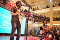 Two black dresses man performing at a mall