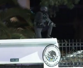 Units of the National Police scaling the walls of the Mexican embassy
