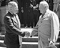 President Harry S. Truman and Prime Minister Winston Churchill shake hands during the Potsdam Conference, 1945