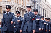 Members of the Royal Air Force wearing peaked caps (July 2011) including a white example worn by an RAF Police airman at the front right.