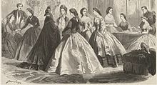 Bodices ended at the natural waistline. Wide pagoda sleeves are in fashion, and skirts are longer at the back; depicting a train.
