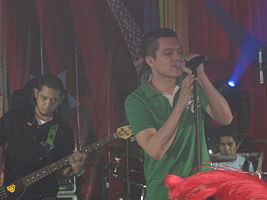 Bamboo during a live performance. From left: Bassist Nathan Azarcon, vocalist Bamboo Mañalac, and drummer Vic Mercado.
