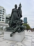 The name of the district comes from the statue of La Défense de Paris by Louis-Ernest Barrias which commemorates the Parisian resistance during the Franco-Prussian War.