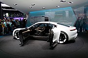 The suicide doors of the Porsche Mission E concept in open position