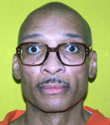 Inmate photo of Ronald Adrin Gray in prisoner jumpsuit, circa March 2008 at Fort Leavenworth