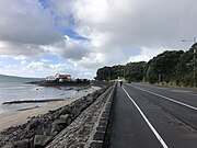 Looking east to Takaparawhau showing Tamaki Yacht Club where Bastion Rock was removed, 2022.
