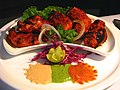 Image 11Chicken tikka, a well-known dish across the globe, reflects the South Asian cooking style. (from Culture of Asia)
