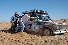 The 4L Trophy is a yearly humanitarian rally and inter-collegiate event across the Moroccan desert. Launched in 1997 by Jean-Jacques Rey, it is organised by Desertours in partnership with the French Grande Ecole Rennes School of Business (Britany).