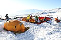 Image 31Winter campers bivouaced in the snow (from Mountaineering)