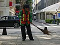 Street sweeper in Paseo de la Reforma in Mexico City, 2004