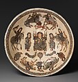 Bowl with enthroned figure and horsemen (Late 12th, early 13th centuries, Iran).[144]