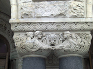 Facade capital indicating the arrival hall.