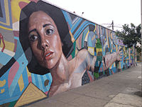Street art mural in Perú. Historical note: Originally, I featured an image of "Sanithna_in_Cabbagetown" (from Atlanta) but that image was deleted from Wikimedia Commons on 10 March 2023. It was an abstract portrait featured here.