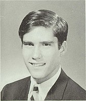 Black and white headshot of a young Romney.
