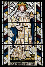 The French saint King Louis IX in the stained glass of the East window of All Saints Church, Cambridge