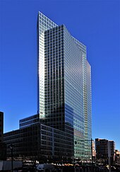 Photo of an office building with a glass and steel exterior