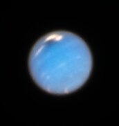 Neptune with its Northern Great Dark Spot visible.