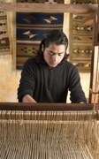 Oaxacan artisan Alberto Sanchez Martinez at loom