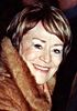 Annie Girardot at the Cesars Award in 2005, wearing a fur coat and looking to the front