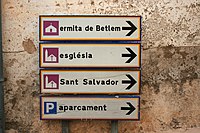 Signs for ermita de Betlem, església, Sant Salvador, aparcament