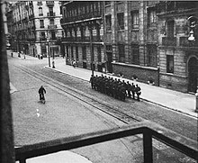 Clandestine photograph taken from a balcony showing a German platoon marching down boulevard Édouard-Rey in Grenoble.
