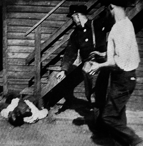 A fifth picture from the series; an African-American man assaulted with stones during the Chicago Race Riot. Note that this picture was printed backwards – see corrected version at[32] A subsequent 6th[34] and 7th[33] picture show the arrival of police officers and the victim.