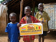 Children welcoming the Budapest-Bamako in Mahina, Mali