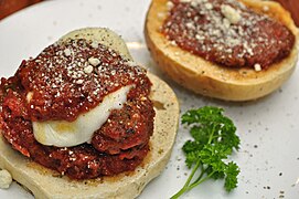 A meatball sandwich prepared using a bun