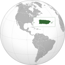 This picture shows Puerto Ricos location. It is situated between the Caribbean Sea and the North Atlantic Ocean with the Dominican Republic to the west and the Virgin Islands to the east.