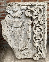 Brâncovenesc cartouche on a damaged stone in the courtyard of Antim Monastery, Bucharest, Romania, unknown sculptor, late 17th-early 18th century