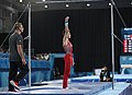 Gymnast sends a signal to the jury that he is ready for the exercise