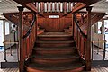 wooden stairway between the two passenger decks