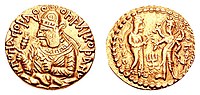 Coin of Huvishka with the divine couple Ommo ("ΟΜΜΟ", Umā) holding a flower, and Oesho ("ΟΗϷΟ", Shiva) with four arms holding attributes. c. 150-180 CE.[23][24]