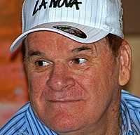 A middle-aged white male wearing a white cap.