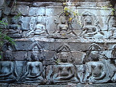 Double row of sculpted Buddhas in sanctuary chamber of temple "X" of Preah Pithu, Angkor, Cambodia.