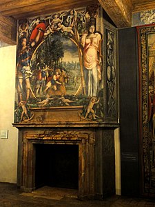 Fireplace in the bedchamber of the King, with a Biblical scene and the coat of arms of Henry II of France
