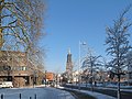 Amersfoort, Strasse (de Utrechtseweg) mit Kircheturm (Onze Lieve Vrouwetoren )