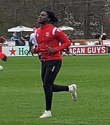 Player jogging during warm-up