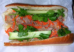 A Vietnamese-style bánh mì with meatballs