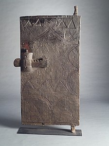 African door with lock, late 19th or early 20th century, wood with iron, from Burkina Faso, in the Brooklyn Museum (New York City)