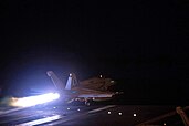 US Navy F/A-18 taking off prior to the airstrikes