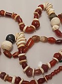 Necklace; probably 2600–1300 BC; carnelian, bone and stone; from Saruq Al Hadid (the United Arab Emirates)