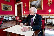 President Joe Biden signing the commission for Avril Haines to become DNI, 21 January 2021.